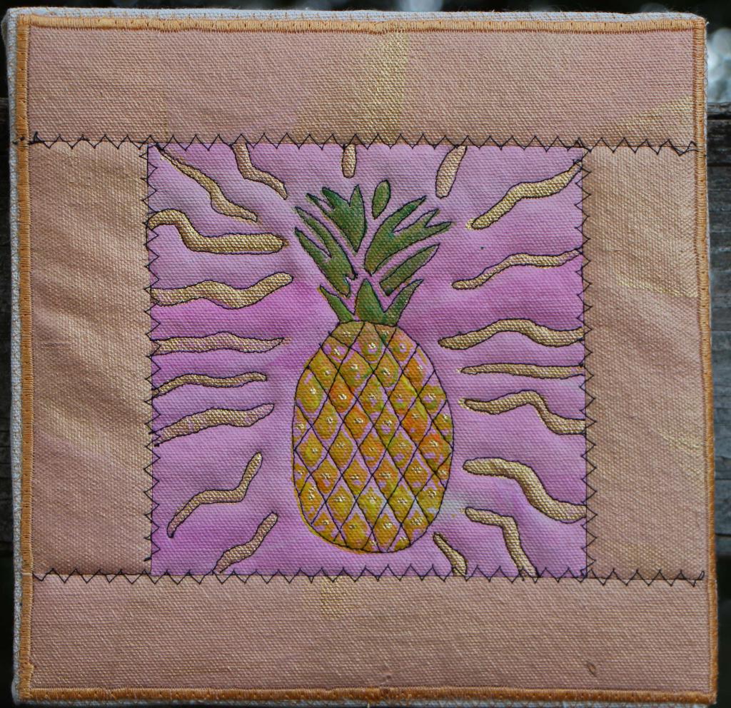 Pineapple  with gold accents on pink with peach border