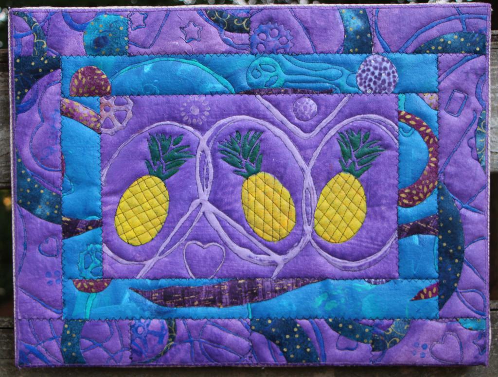 Triple pineapples on violet with blue and purple borders